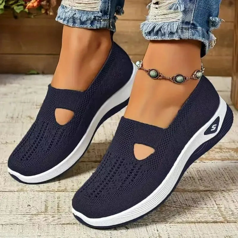Women's casual T-strap mesh shoes with a round toe and flat heel in multiple colours.