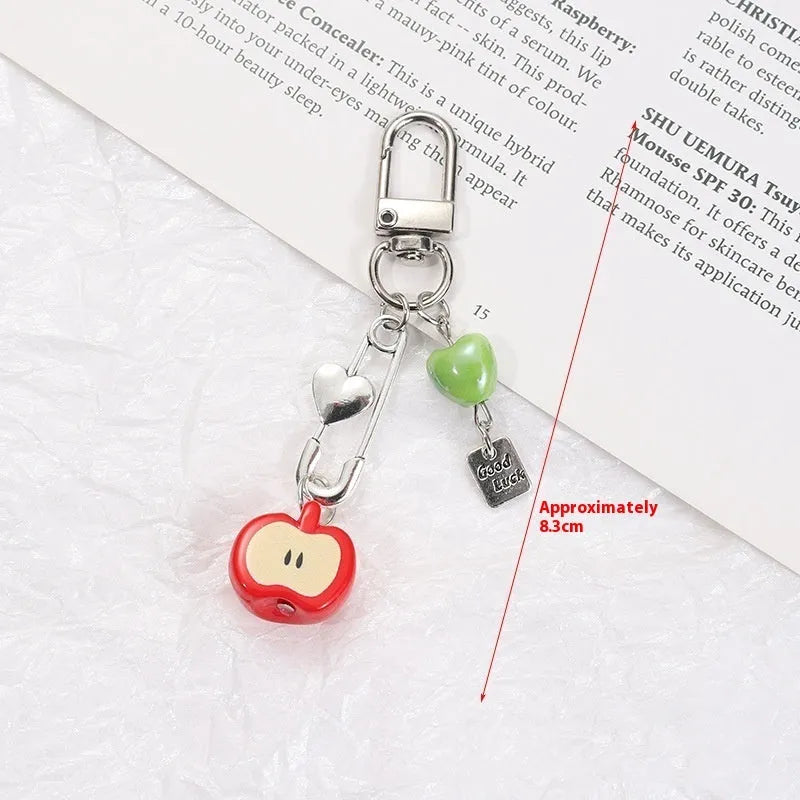 Fruit pattern mobile phone charm keychain with apple and strawberry designs on plastic resin