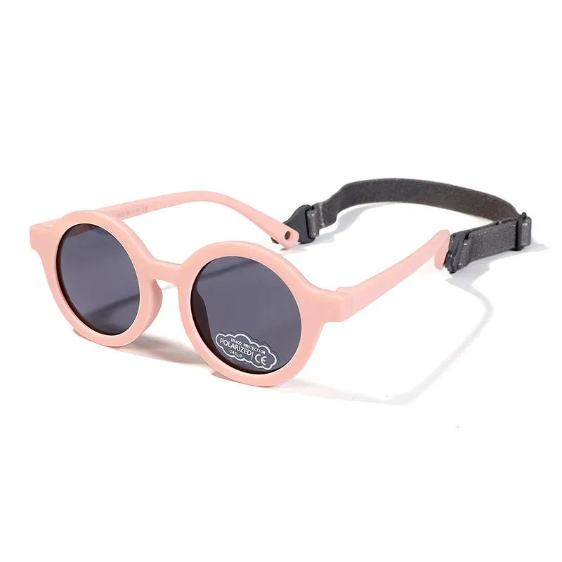 Children's silicone sunglasses with round frame for 0-3 year olds showing colour options