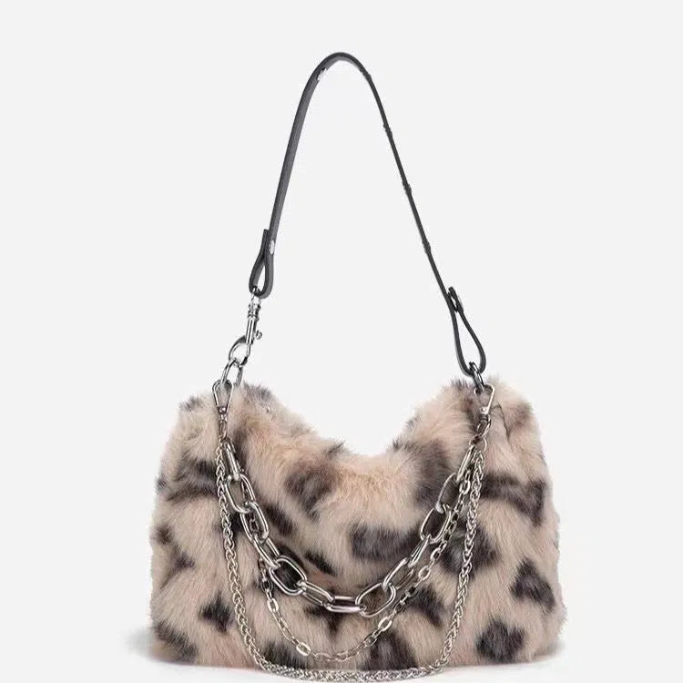Plush shoulder bag with chain and leopard print detail, horizontal rectangular shape, single strap, available in grey, pink, apricot, and white.