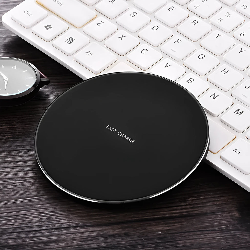 Ultra-thin wireless charger 98x98x6.5mm in black, red, white, and yellow, with 8mm transmission distance and fast charge support.