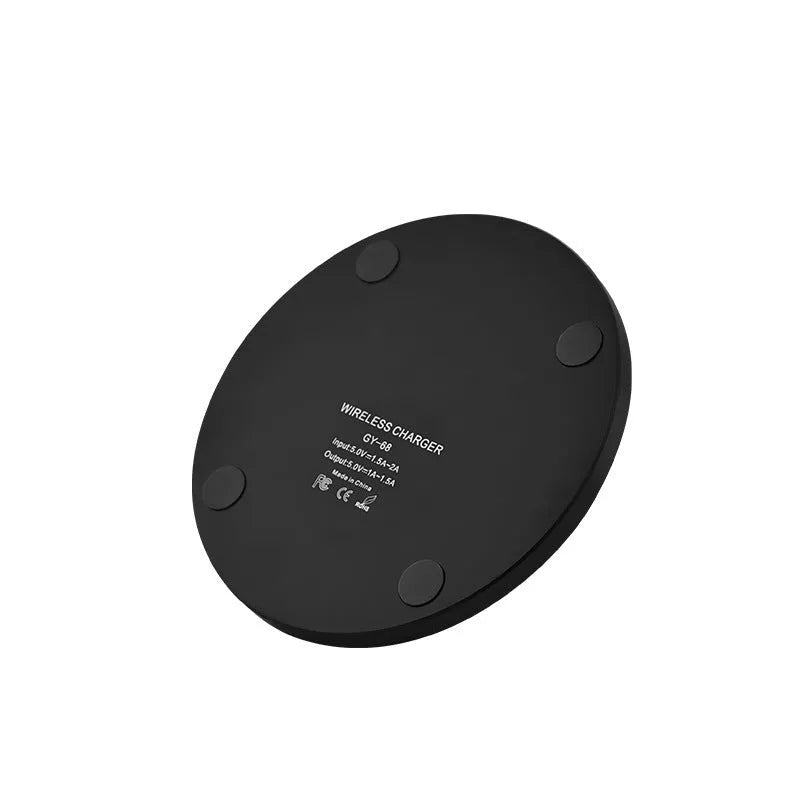 Ultra-thin wireless charger 98x98x6.5mm in black, red, white, and yellow, with 8mm transmission distance and fast charge support.