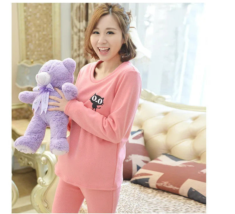 Maternity thermal underwear set in black, cotton long-sleeve top and long pants with cartoon pattern.