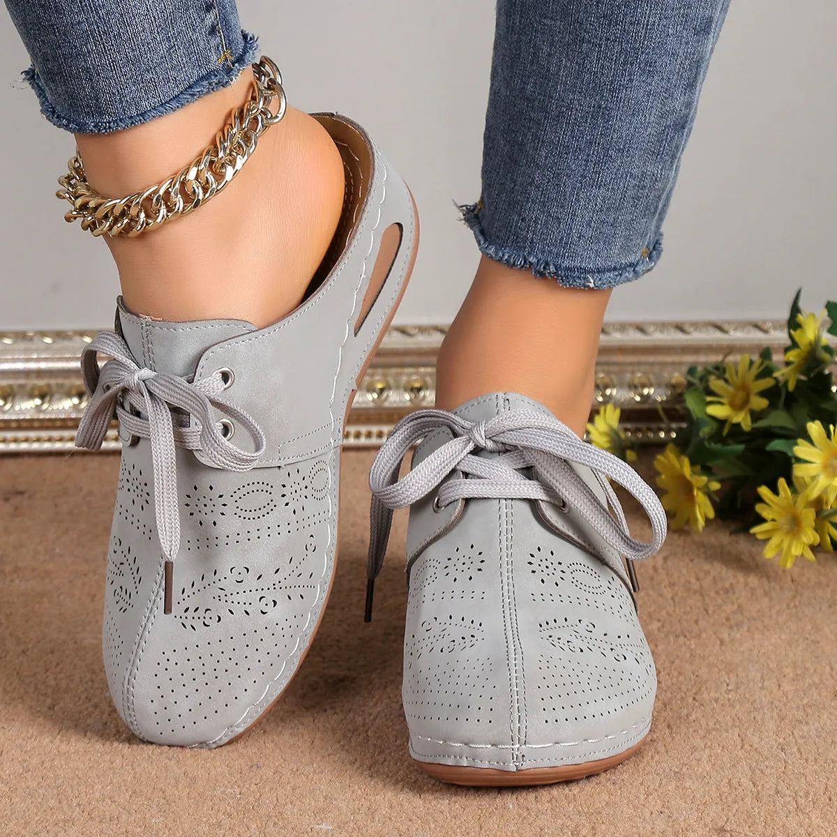 Women's lace-up summer slippers with suede upper, wedge heel, and rubber sole in various colours.