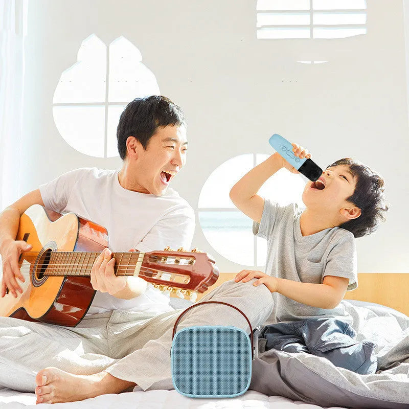 Compact portable Bluetooth speaker with built-in microphone in white pink or blue plastic case