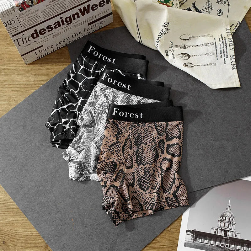 Men's loose fit thin boxer shorts in black, grey, or brown polyester knit fabric.