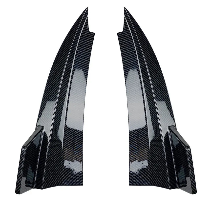 Pair of car rear bumper corner protectors in carbon fibre pattern on a vehicle rear corner