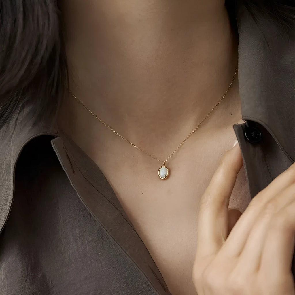 Geometric oval pendant necklace with jelly opal stones in 925 silver with gold plating