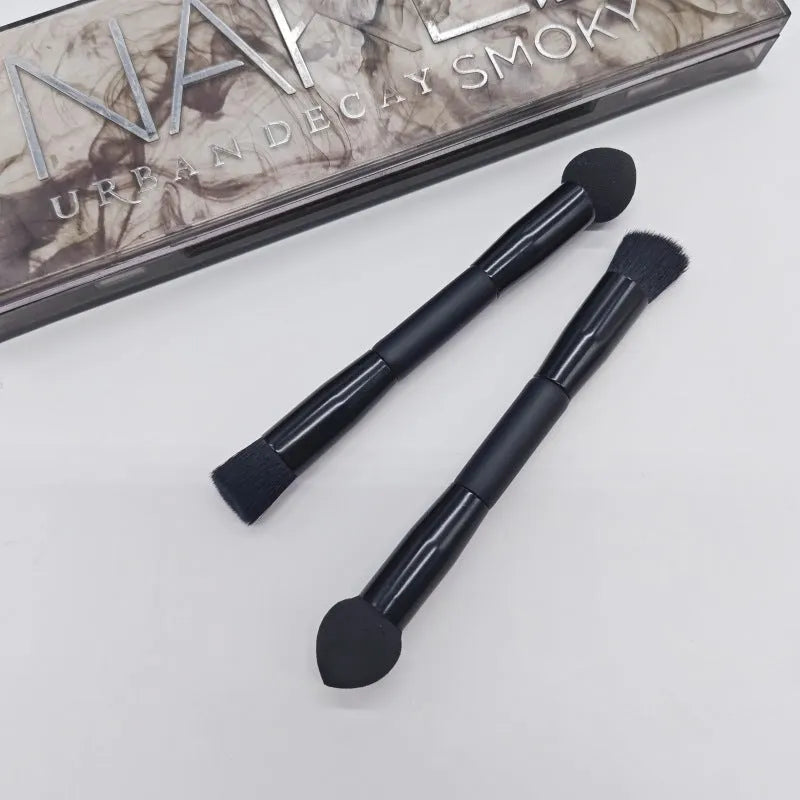 Double-headed miter sponge concealer brush with black artificial fibre bristles and wooden handle