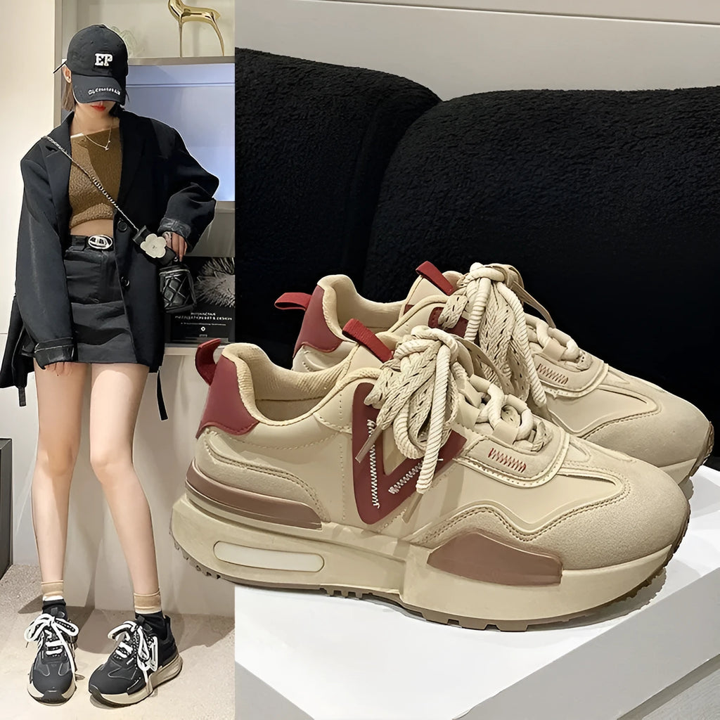 Women's black retro platform sports shoes with lace-up front and round toe on a rubber sole.
