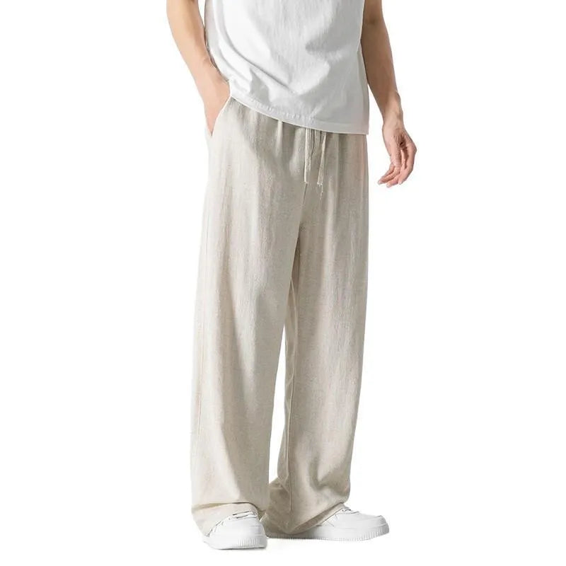 Men's linen trousers in straight-leg cut with cropped length and drawstring waist in beige colour