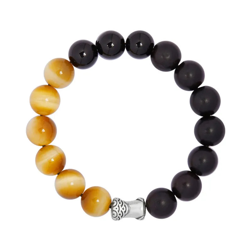Men's handmade obsidian bracelet with sterling silver accents, Mountain and Sea Fearless design