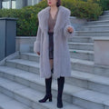 Women's grey thick faux rabbit fur mid-length leather coat with fur collar