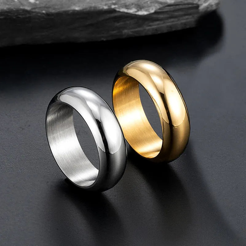 Glossy electroplated titanium steel ring shown in gold, black, and steel colour options.