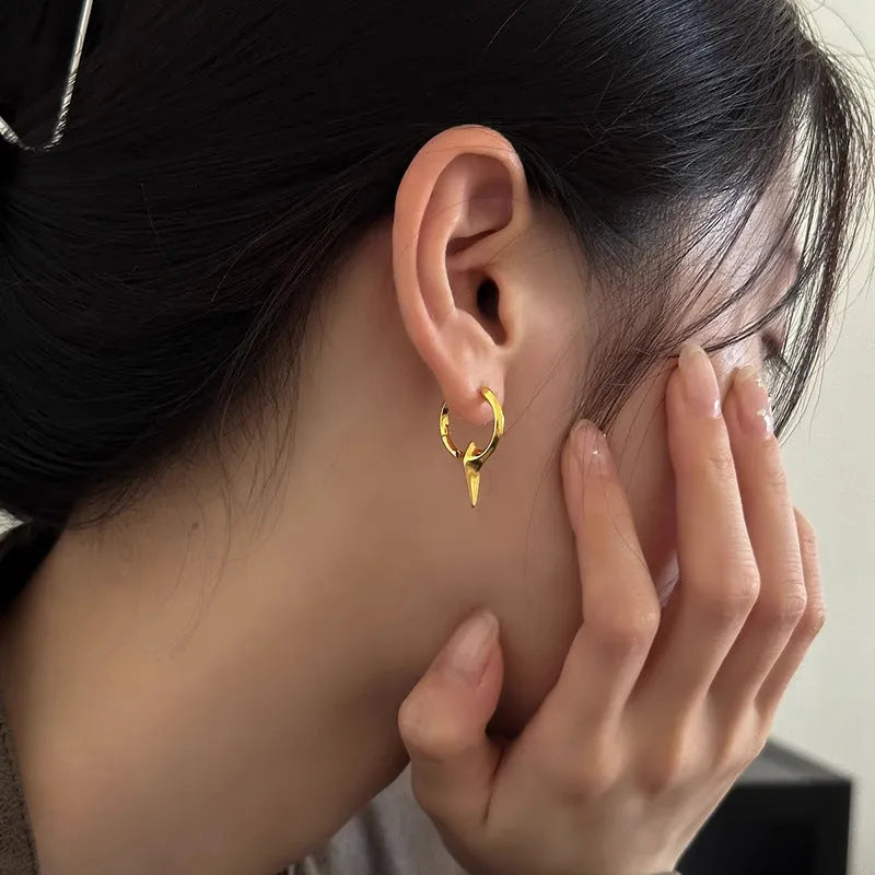 Platinum electroplated geometric star-shaped clip-on earrings for women.