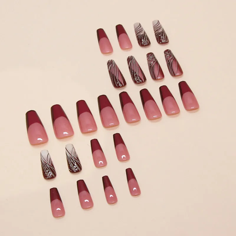 Pack of French line pattern fake nail stickers with glue on a white background.