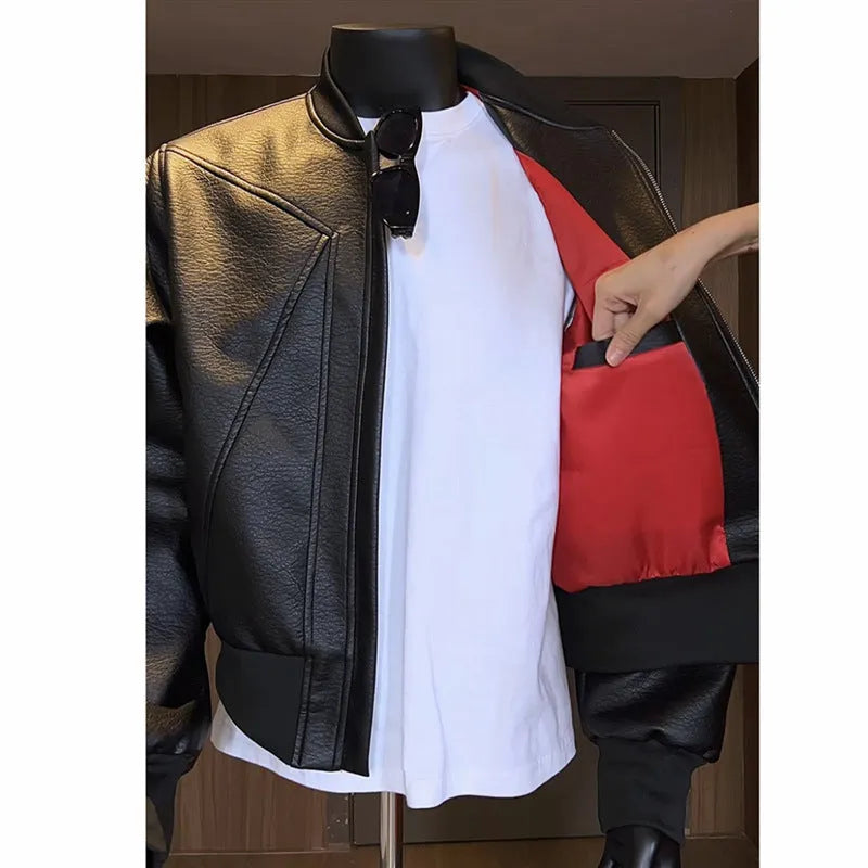 Men's black PU leather jacket with extended length and distinctive texture
