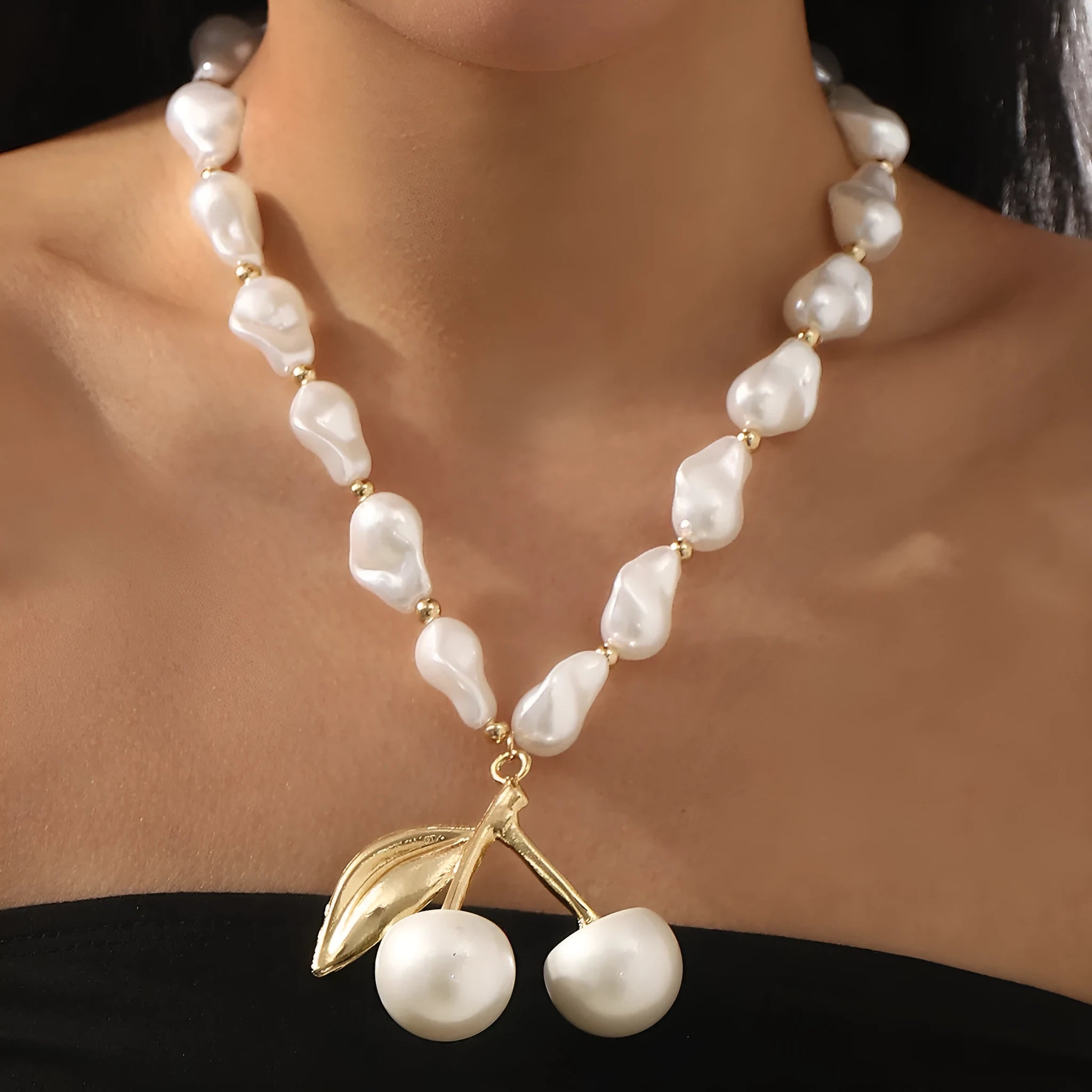 Women's creative pearl necklace with geometric fruit pendant in gold or white finish options