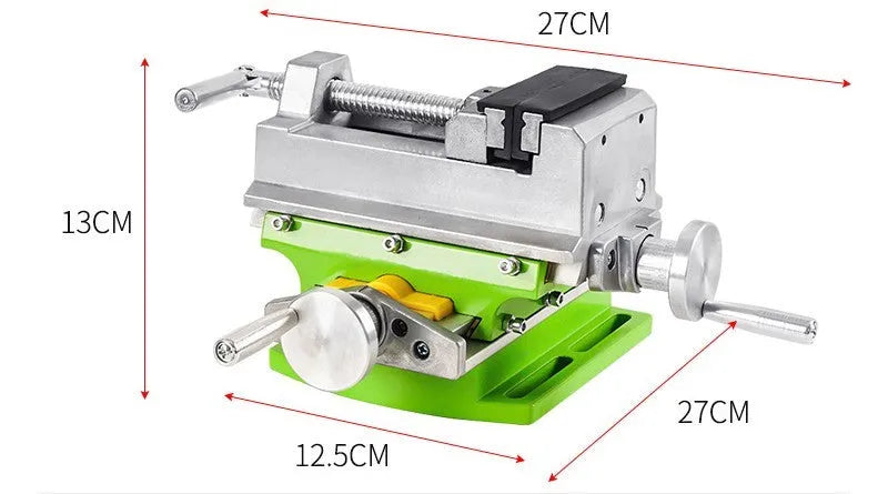 Bench drilling and milling machine with cross bench pliers and heavy duty bench pliers on a workshop table
