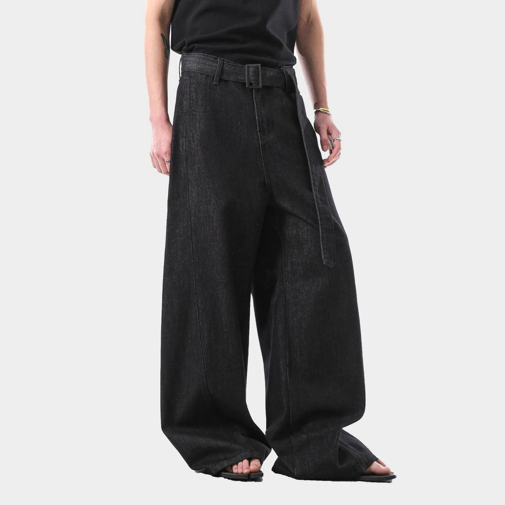 Black high waist straight leg jeans on a neutral background