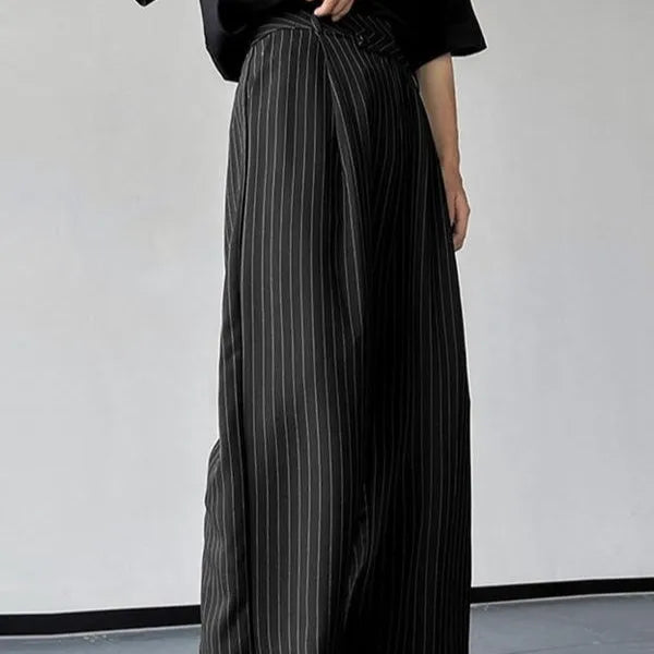 Black men's casual trousers with vertical stripes and front pleats, made from a soft rabbit hair and bamboo fibre blend.