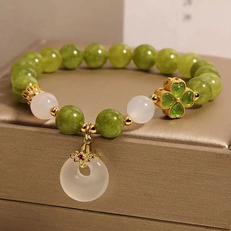 Natural green tourmaline women's bracelet with four-leaf clover design and safety buckle in New Chinese style