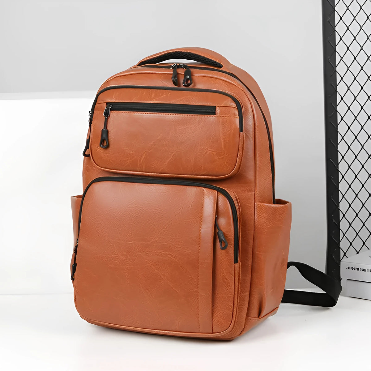 Large capacity men's black business commute backpack in composite cowhide PU with 20-35L capacity and curved shoulder straps