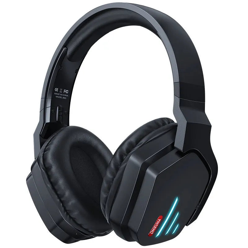 Luminous black wireless head-mounted stereo headphones with ear cups and headband on a grey background.