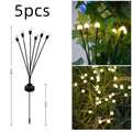 Solar-powered LED ground spike lamp with multiple light heads for garden pathway lighting
