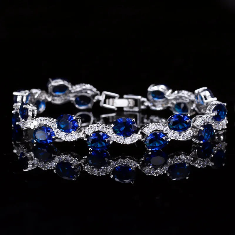 Geometric simple style gold plated bracelet with AAA zircon stones on a white background.