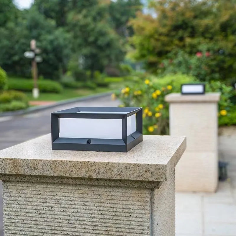 Aluminium outdoor solar-powered LED column light in two size options for garden or doorway use.