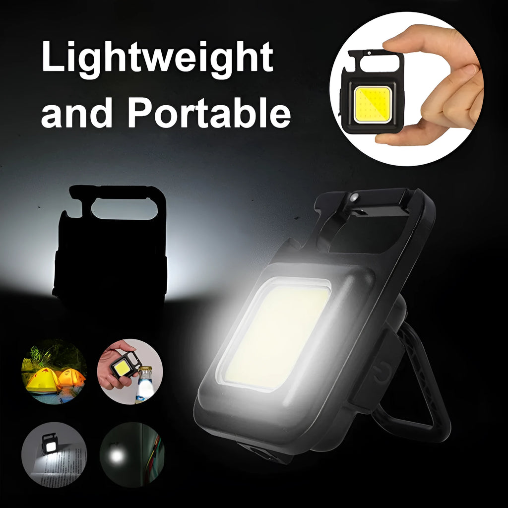 Black aluminium USB rechargeable keychain flashlight with magnetic base and foldable handle