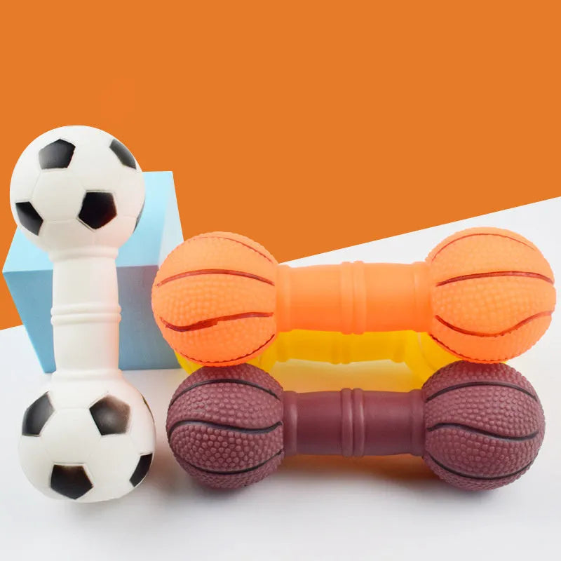 Brown, orange, white and yellow PVC football dumbbell dog toy with squeaker.