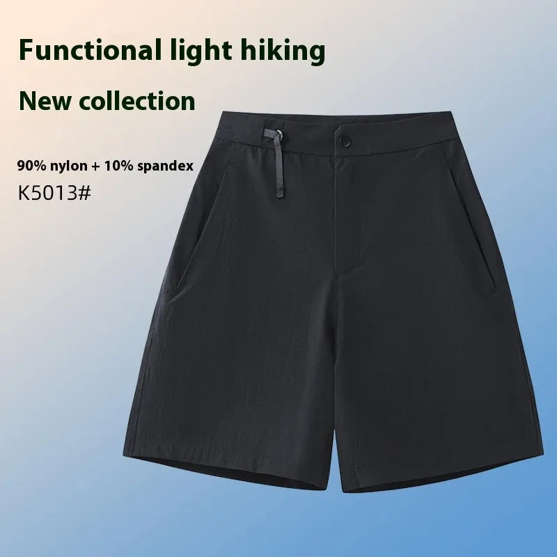 Men's solid colour sport shorts with elastic waistband, shown in army green, for running and climbing activities.
