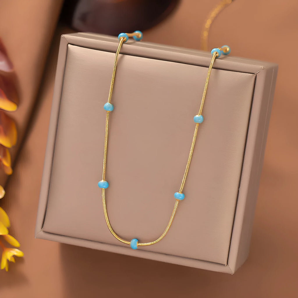 Titanium steel ball drop glaze necklace on stainless steel clavicle chain in Green Pearl Gold