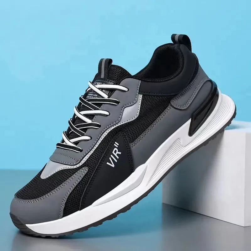 Men's colour block mesh running shoes in low-top design with lace-up front.