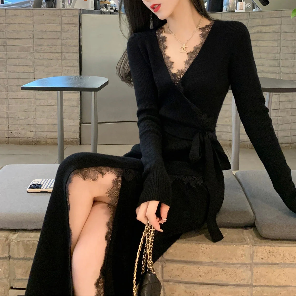 Black women's slim fit woolen skirt with princess dress design on a mannequin
