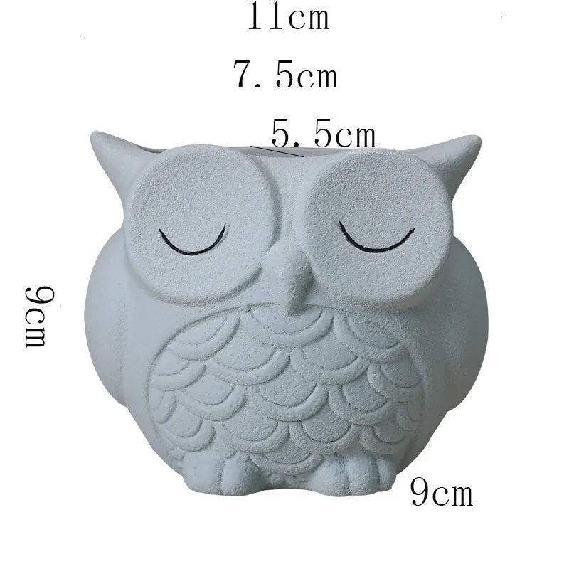 Handmade frosted ceramic flower pot with a cartoon owl design for succulents.