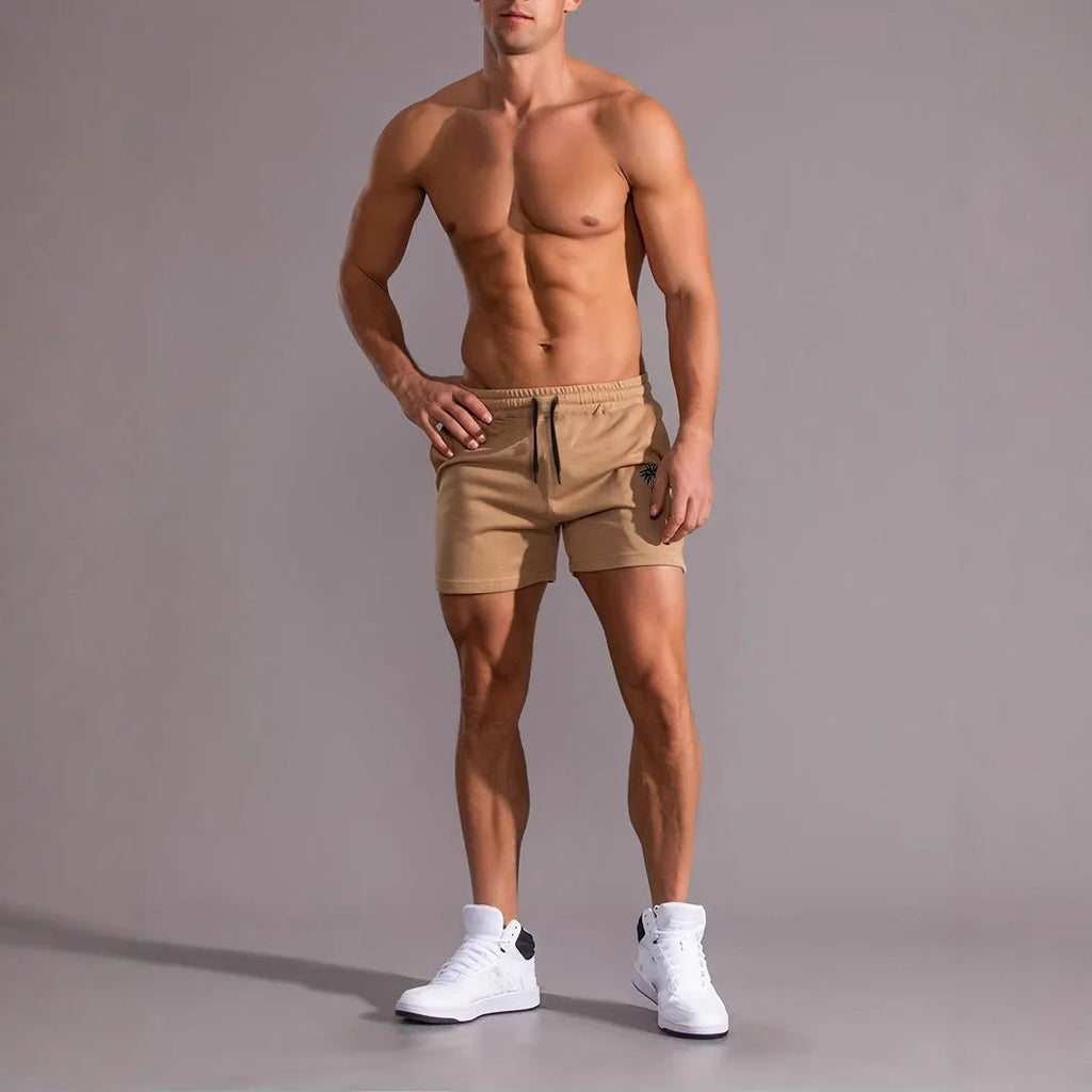 Khaki men's coconut print sports shorts with straight leg and elastic waistband