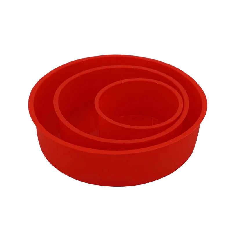 Set of three round red silicone cake moulds in 4-inch, 6-inch, and 8-inch sizes.