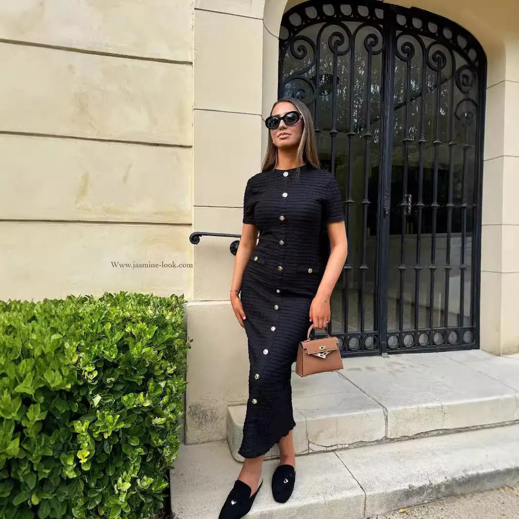 French retro slim fit knitted long-sleeved dress in black with button detailing and one-step skirt