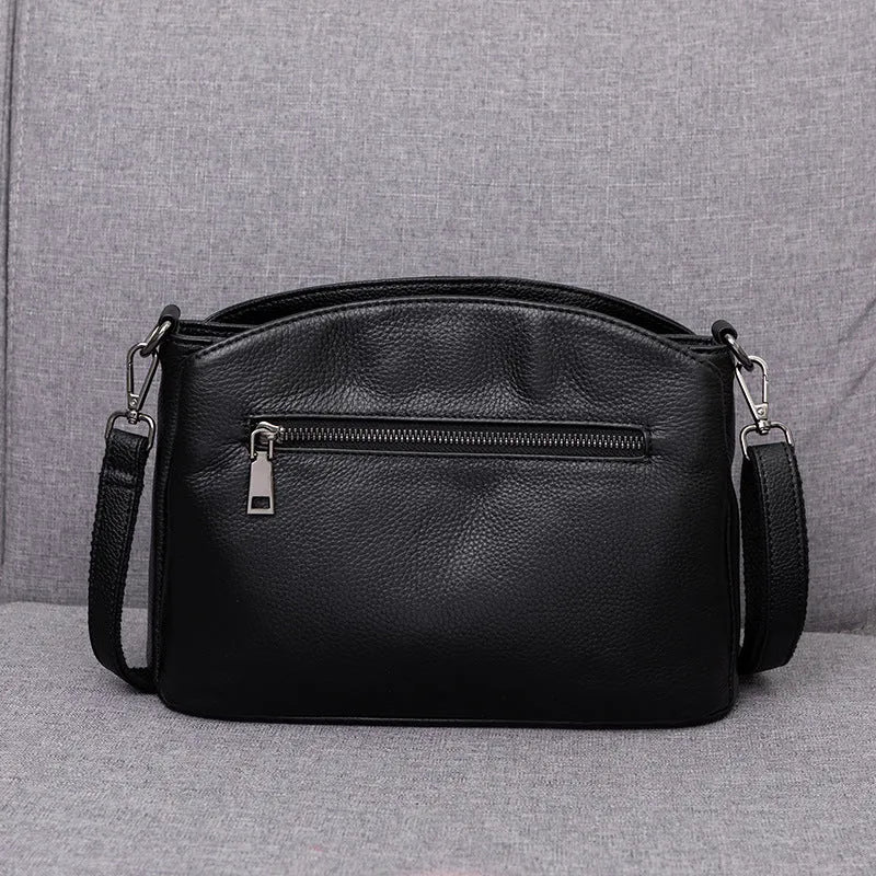Genuine leather handbag with plaid pattern, single strap, horizontal square shape, medium soft.