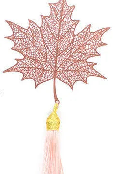 Rose gold brass bookmark with hollow maple leaf design and attached tassel.