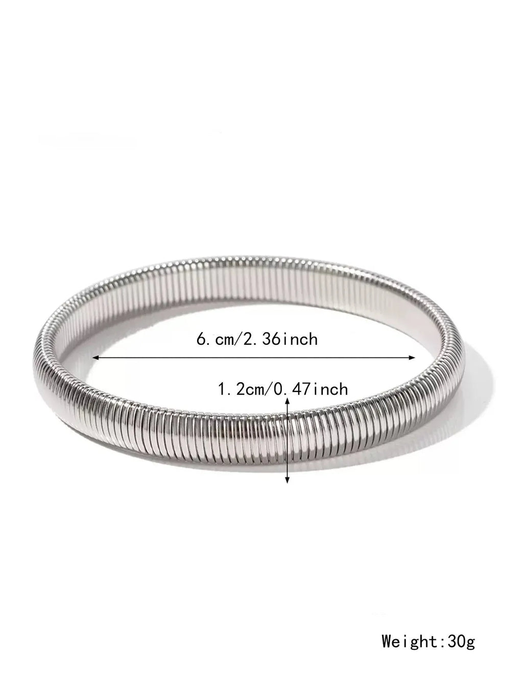 Close-up of a women's titanium steel bracelet with an exaggerated vertical stripe ring elastic design in a gold finish.