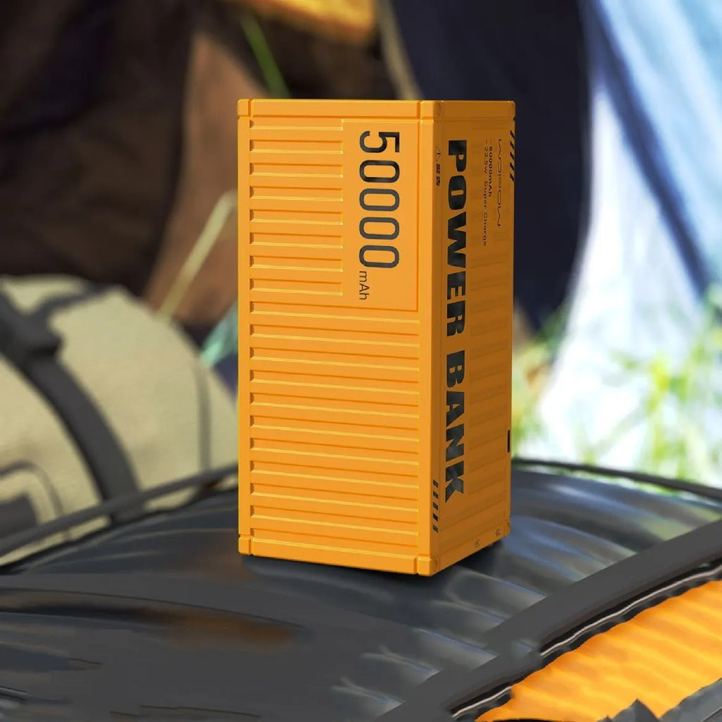 Yellow 50000mAh digital display power bank with five charging ports and emergency lighting