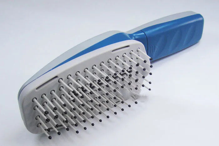 White electronic pet comb with negative ion and active oxygen technology, removable brush head, and 78 teeth.