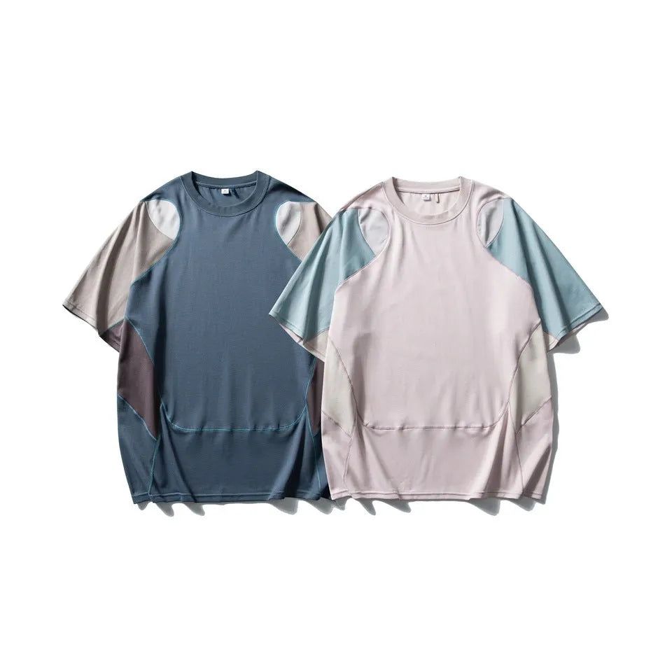 Men's loose grey and blue patchwork sports T-shirt with raglan sleeves on a hanger