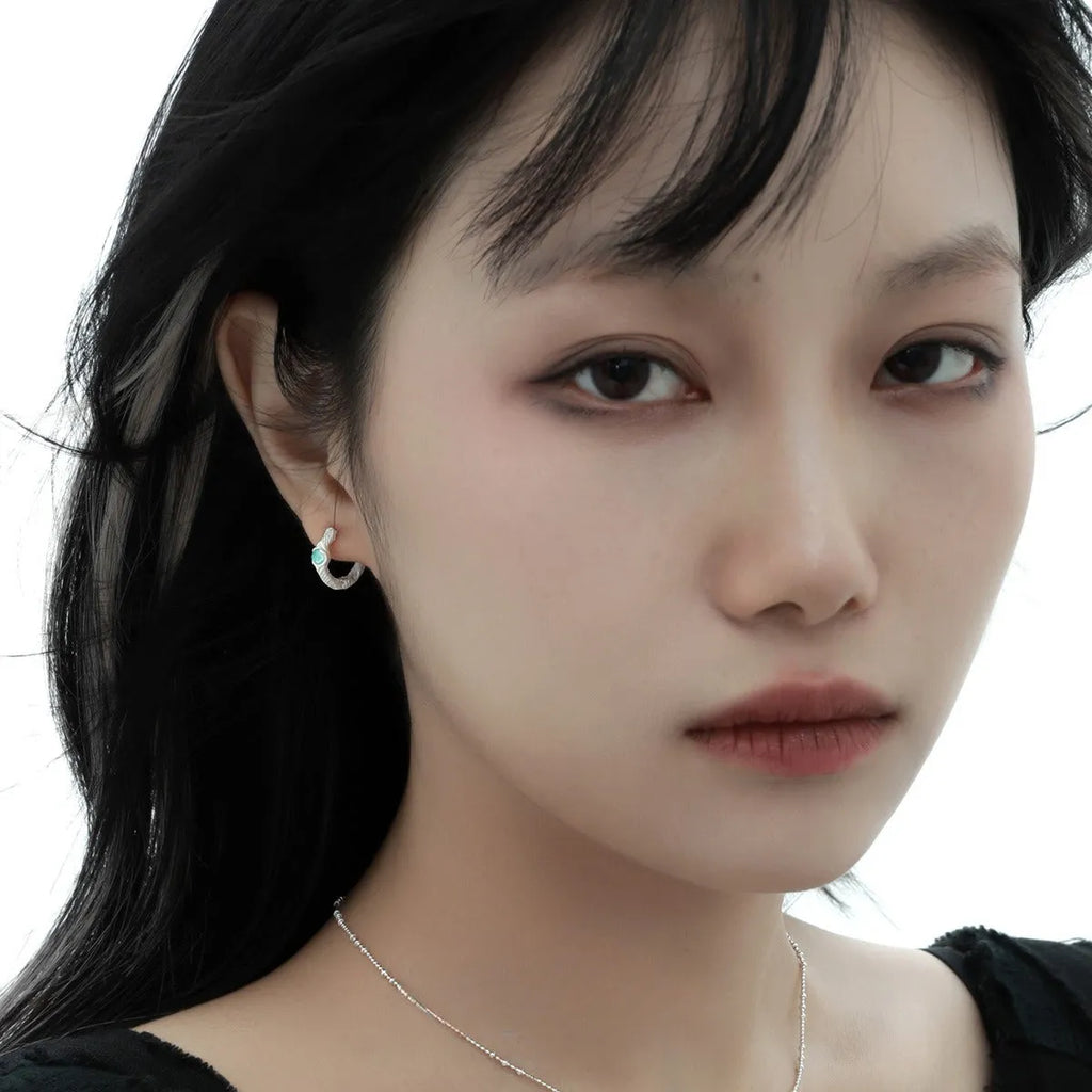 925 silver geometric ear clip with circular design in burnt silver finish