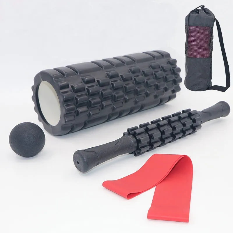 Black foam massage roller measuring 33cm with six separate massage pieces along shaft