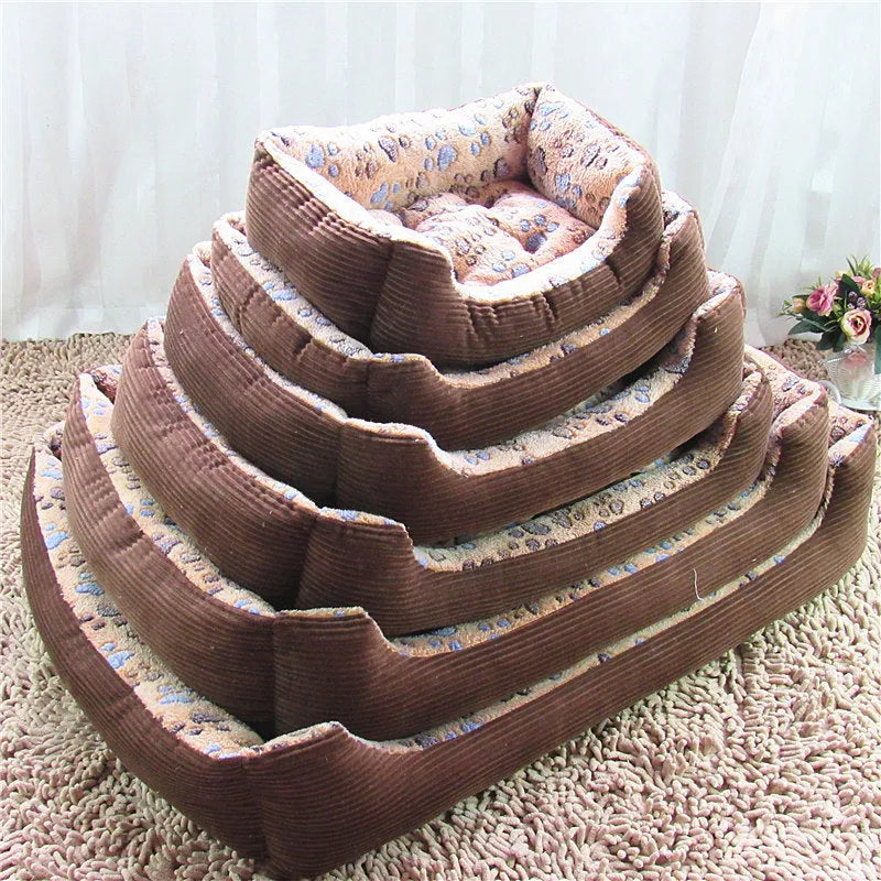 Beige plush pet bed with raised sofa-style edge and removable cushion for small dogs
